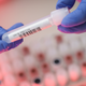 A lab worker handling a positive covid-19 sample at the Hermes Pardini Lab in Brazil.